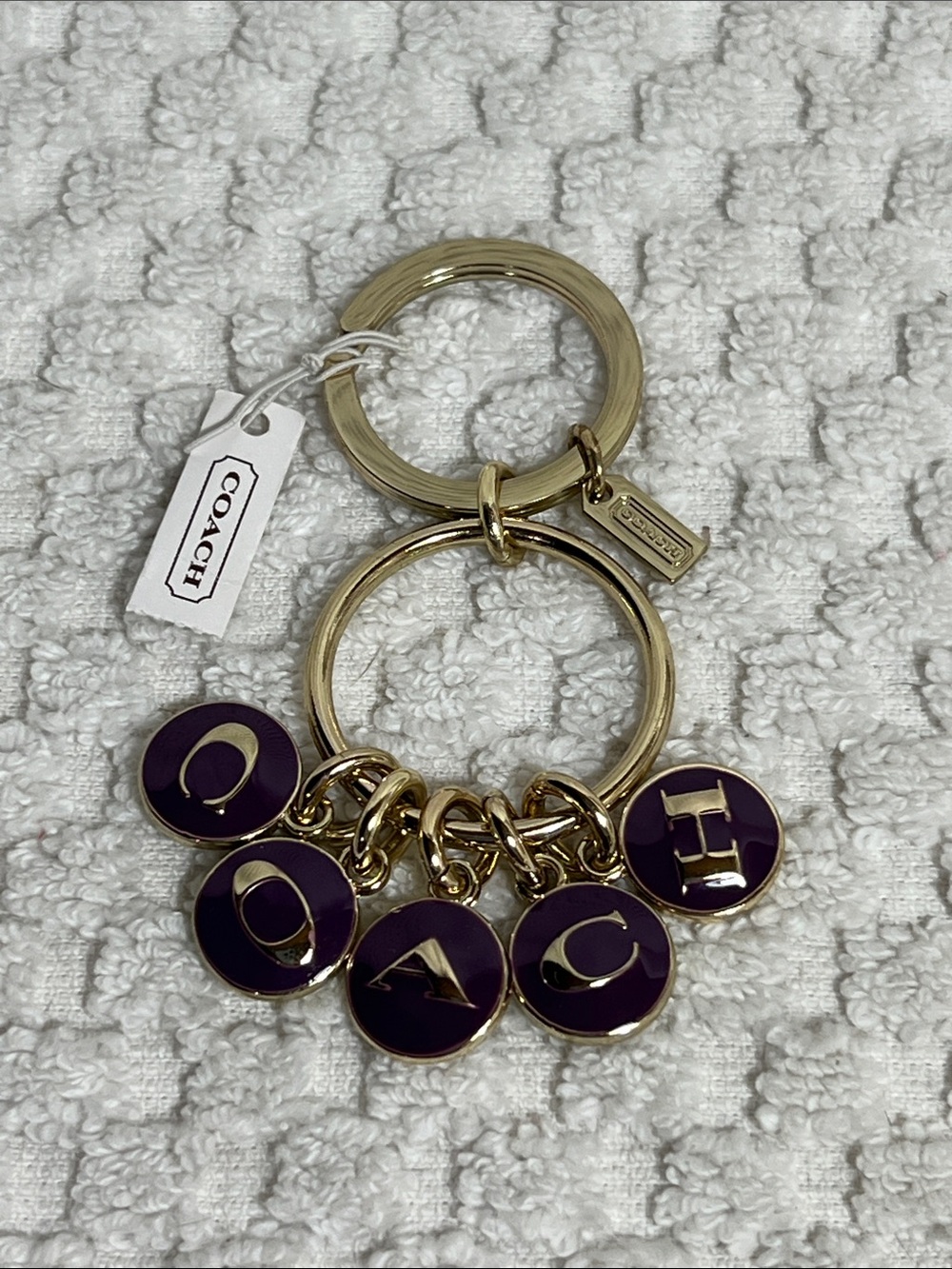 Coach Gold-Tone Key Ring with Purple Enamel Letters